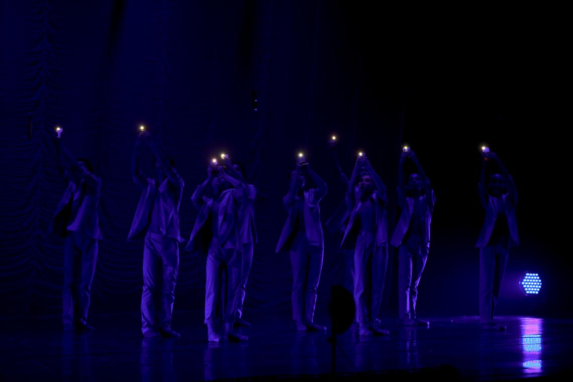 Dancers raise their phones as torch lights during Life Element – O2, a modern ballet production staged in Ulaanbaatar, Mongolia, to call for action against air pollution.
