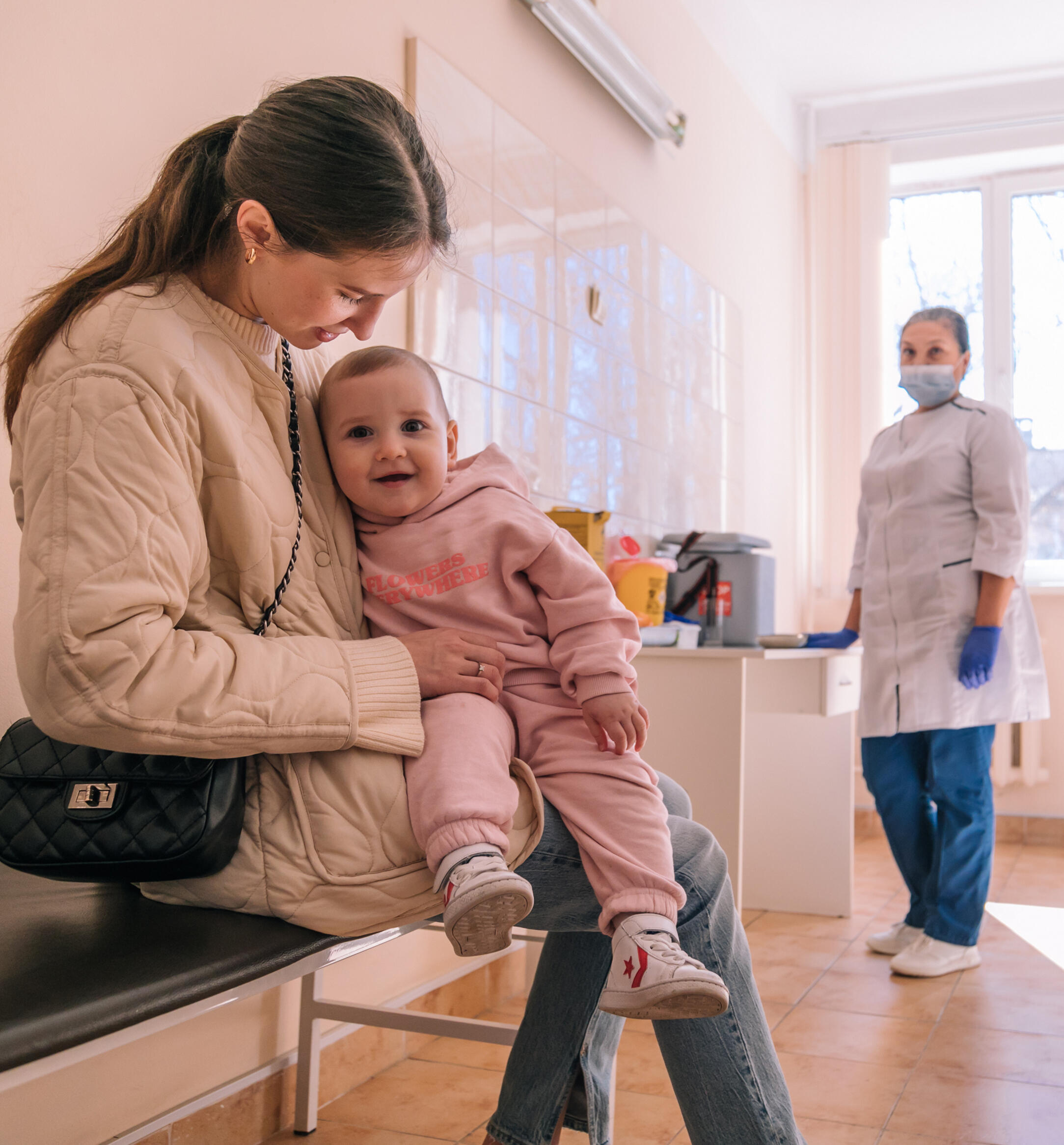 March 14, 2023, Odesa, Ukraine. Little one-year-old Vira came to Odesa City Children's Polyclinic No. 4 with her mother Oleksandra in order to have her routine vaccination in her leg.