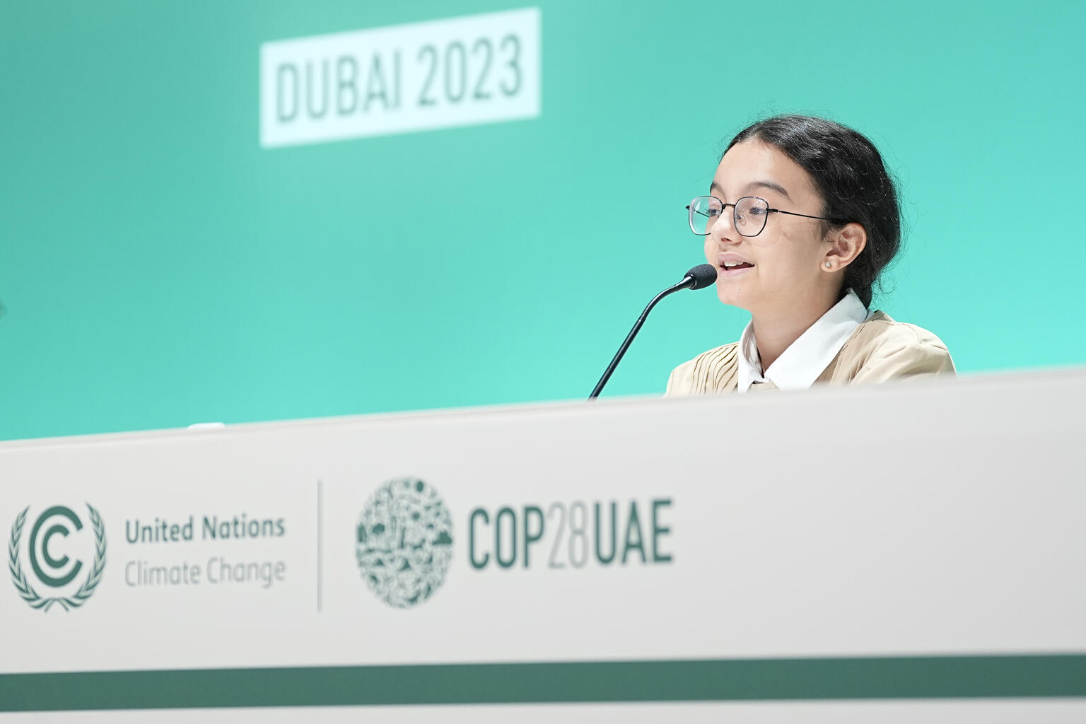On 6 December 2023, Revan Ahmed, 13-year-old UNICEF Youth Advocate from Libya, briefs press during the UN Climate Change Conference (COP28) at Expo City Dubai in United Arab Emirates.