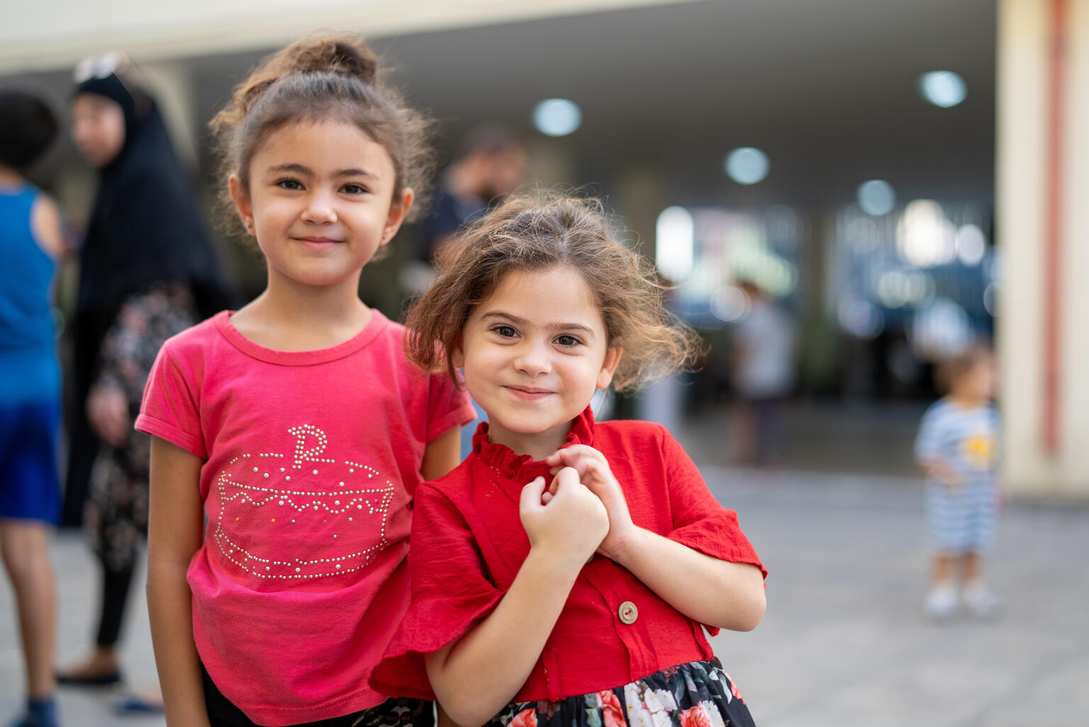 Maya and Ilas, 4- and 5-year-old girls, had to leave their home behind, after it got destroyed following a airstrike that fell nearby. "When the missile hit the house next to us, all the glass shattered, and dust was everywhere. We ran to the corner, hugged each other, and started crying." Photo taken on Thursday, 03 October 2024, in a shelter in Beirut. Photo credit: Fouad Choufany