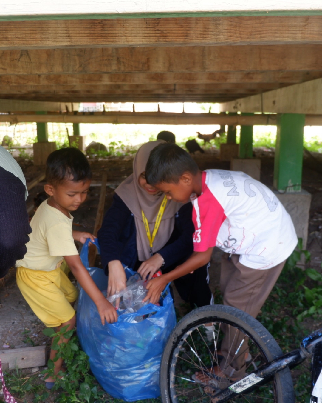 Children sort plastic in Indonesia