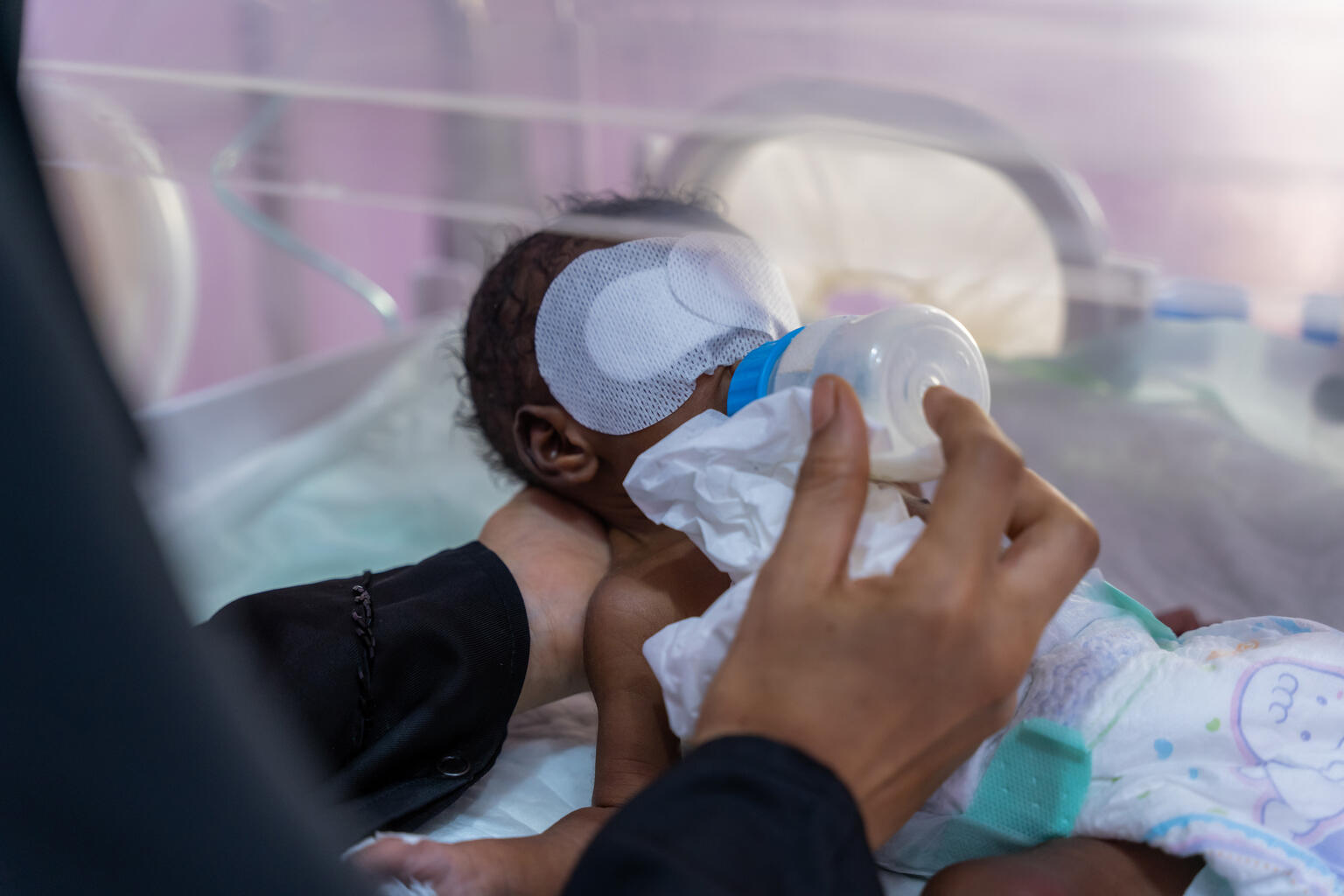 Aden, Yemen. Children in the NICU department inside incubators receive care from doctors and health in Al-Sadaqah Hospital.