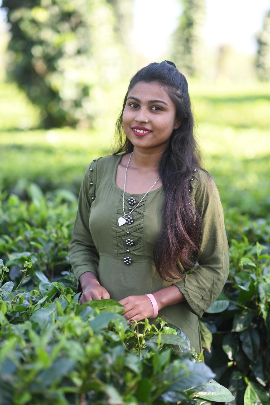 Vandana Urang, age 18, leader of Muskan adolescent girls' club of Namroop Tea Estate and is a BA first-semester student poses for a photograph at Namroop Tea Estate in Dibrugarh district, Assam.