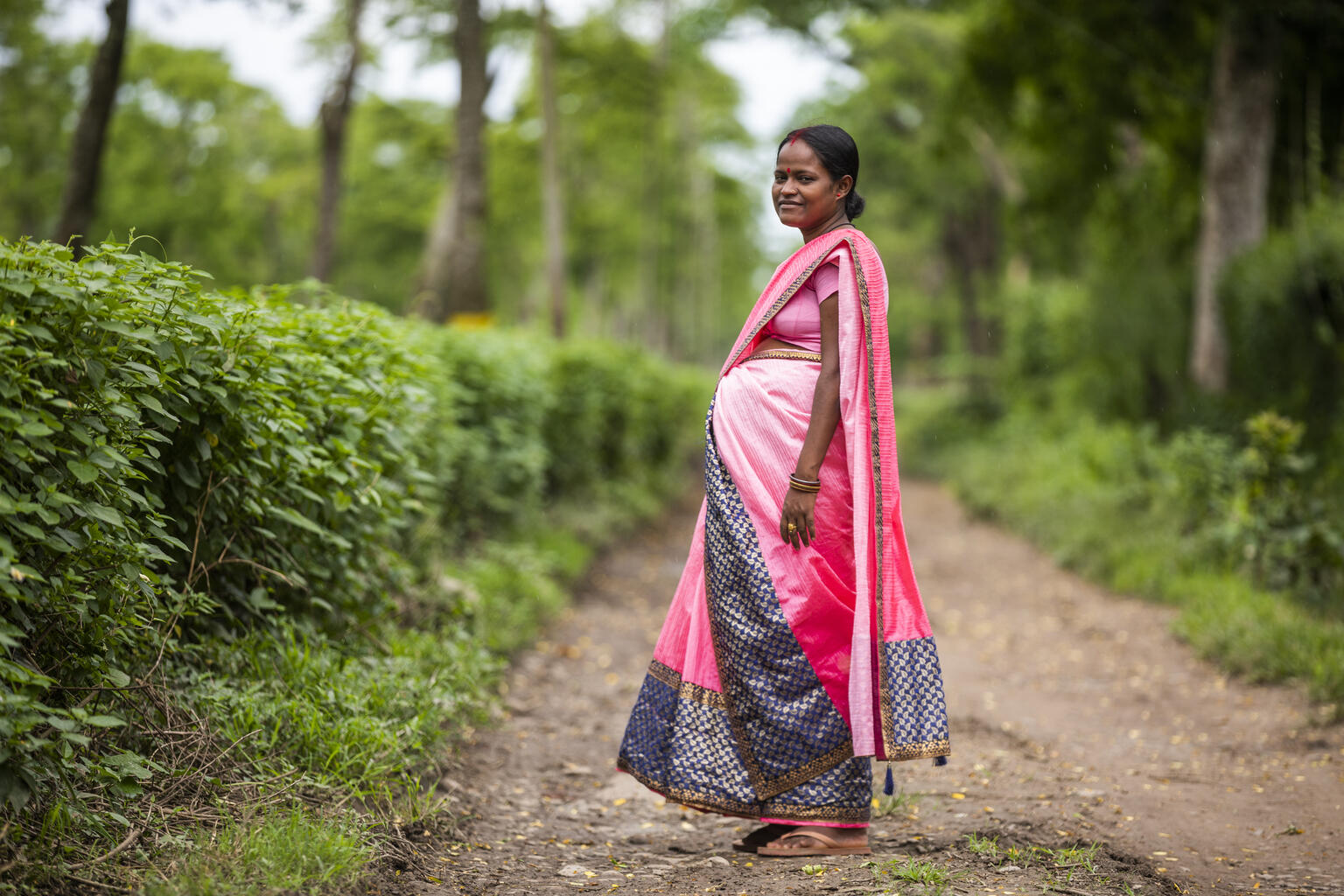 30 years old Debonti Nayak, reacts after a prenatal check-up at a dispensary in Muttuck Tea estate, Assam, India.